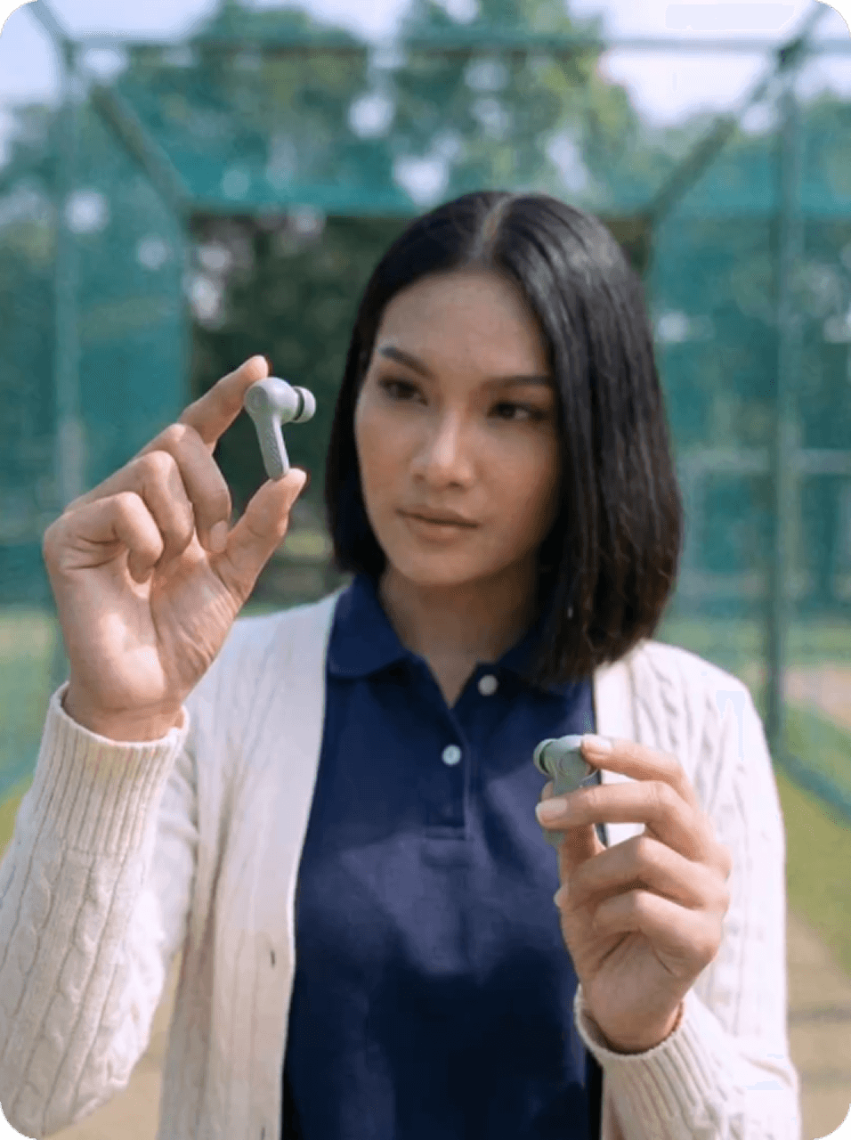Model holding a product in an outdoor lifestyle shot