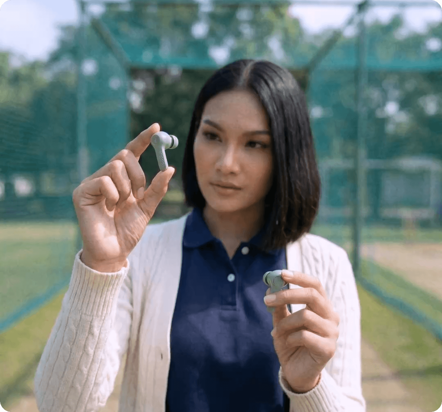 Woman holding a small beauty product
